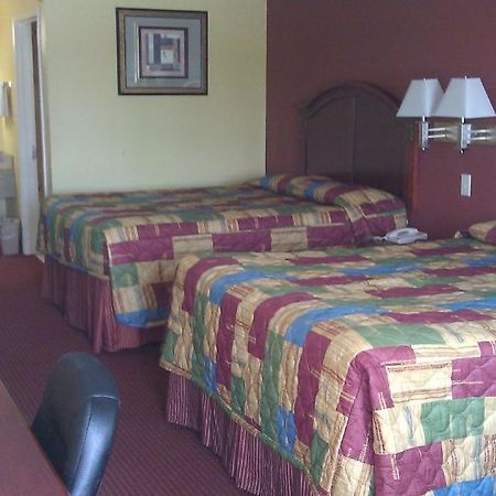 Scottish Inns Suites East Sam Houston Pkwy North Чаннелвью Номер фото