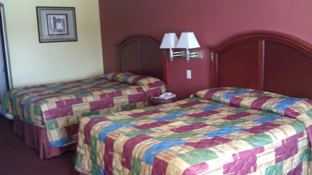 Scottish Inns Suites East Sam Houston Pkwy North Чаннелвью Номер фото