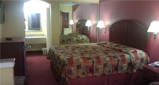 Scottish Inns Suites East Sam Houston Pkwy North Чаннелвью Номер фото