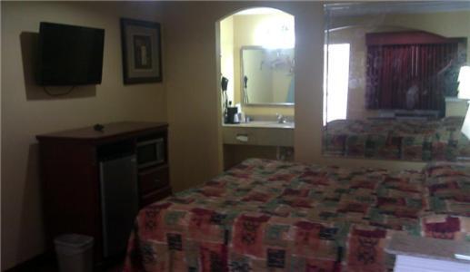 Scottish Inns Suites East Sam Houston Pkwy North Чаннелвью Номер фото